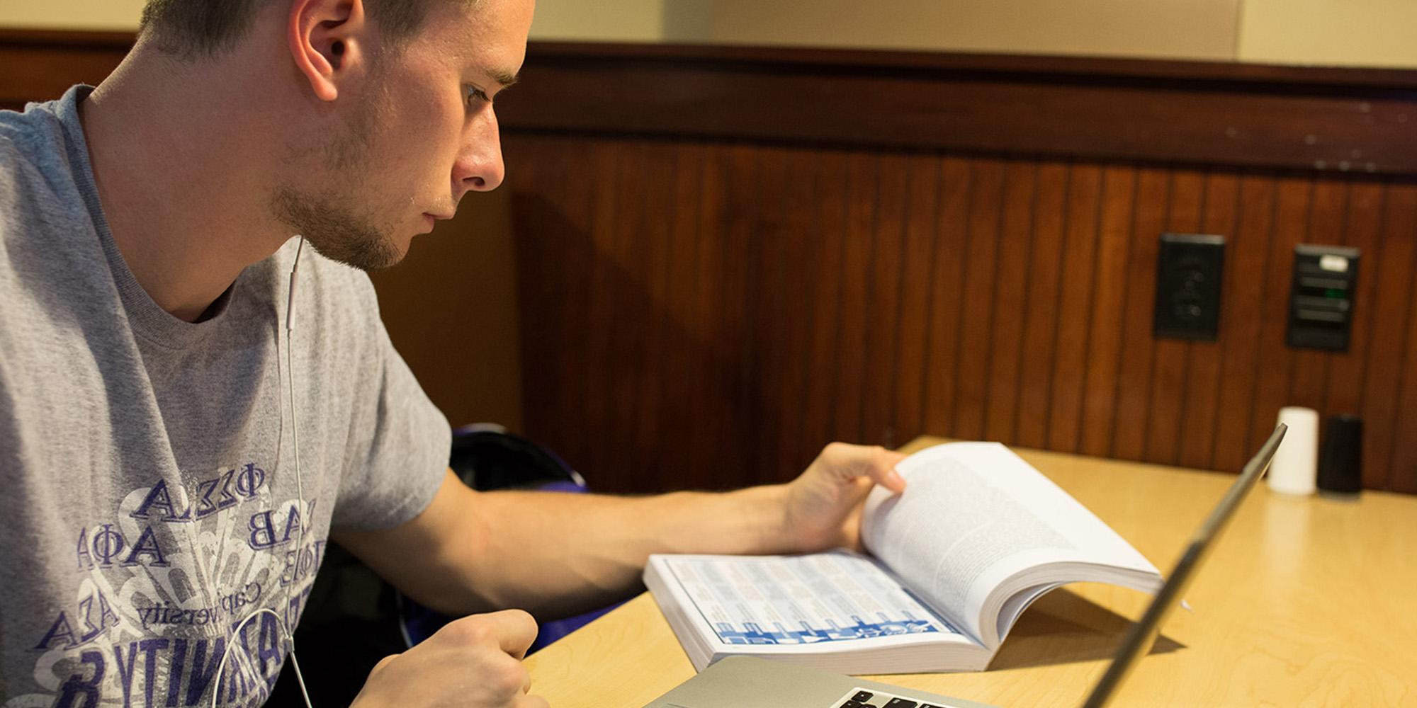 Male Student Studying Computer Science